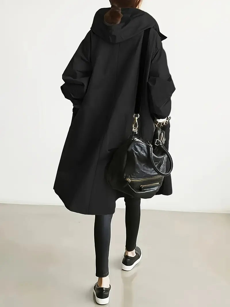 Edna oversized waterproof trenchcoat in black, back view