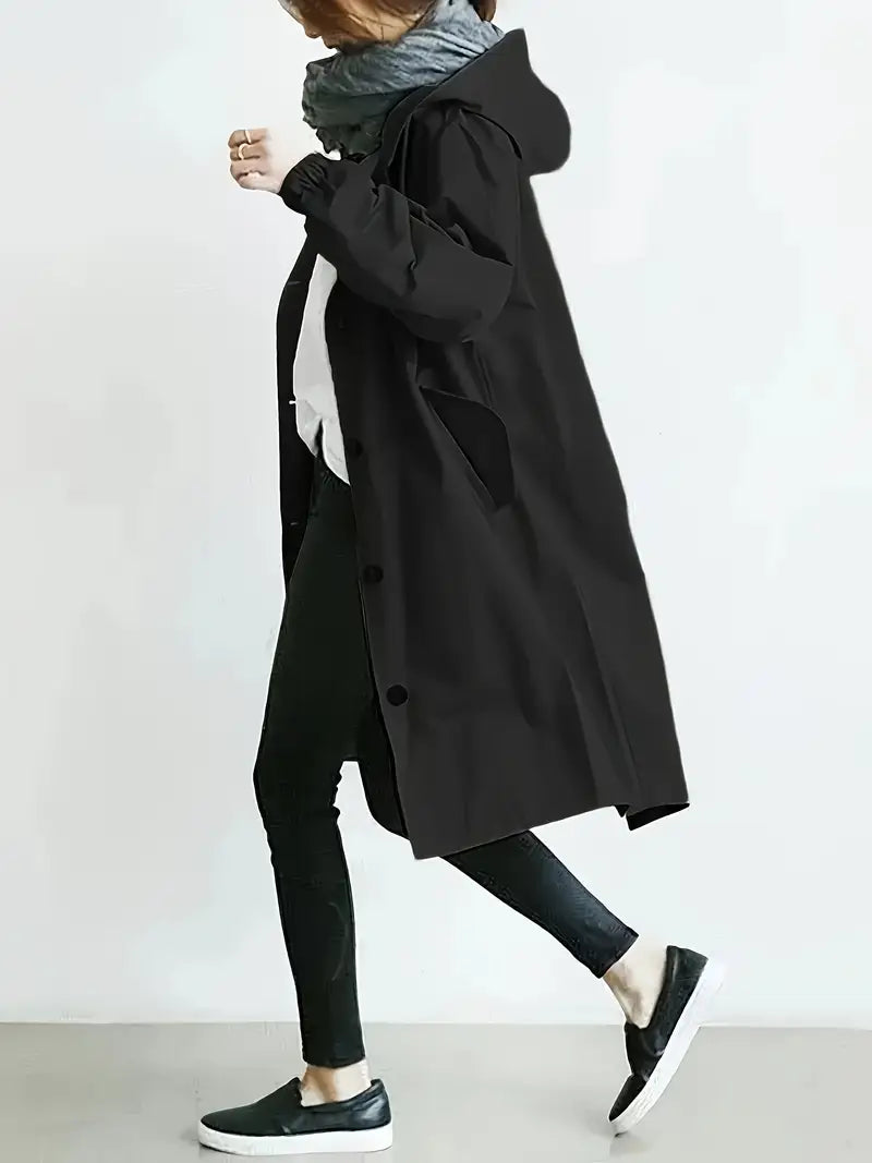 Edna oversized waterproof trenchcoat in black, side view