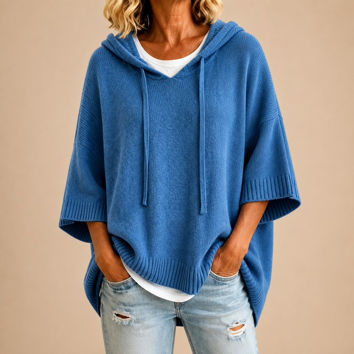 Lucille hooded knit poncho in blue, front view