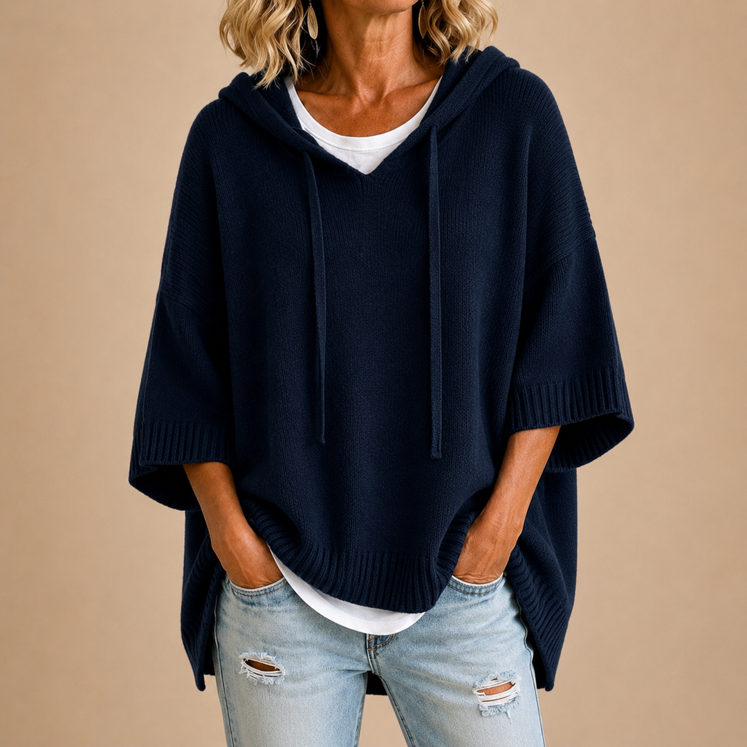 Lucille hooded knit poncho in navy, front view