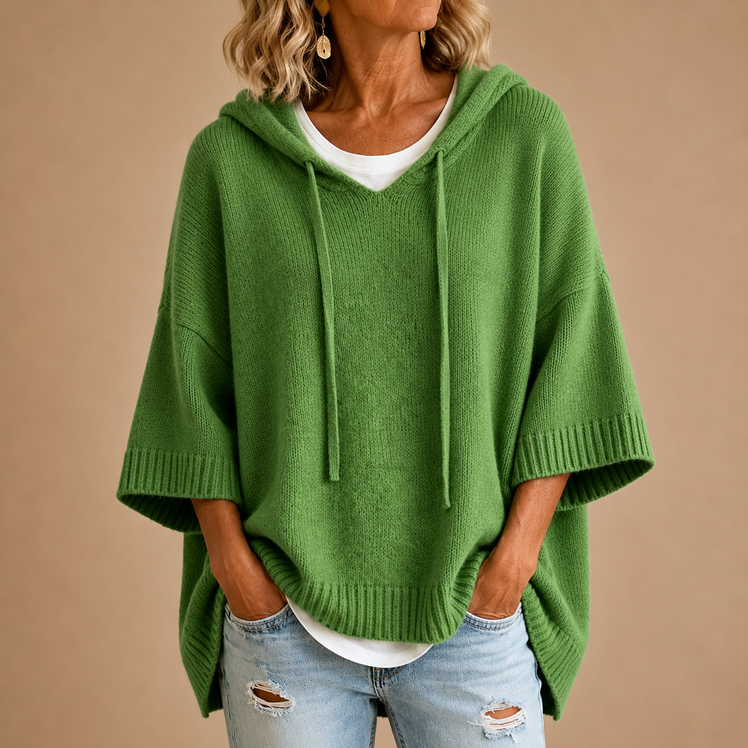 Lucille hooded knit poncho in green, front view