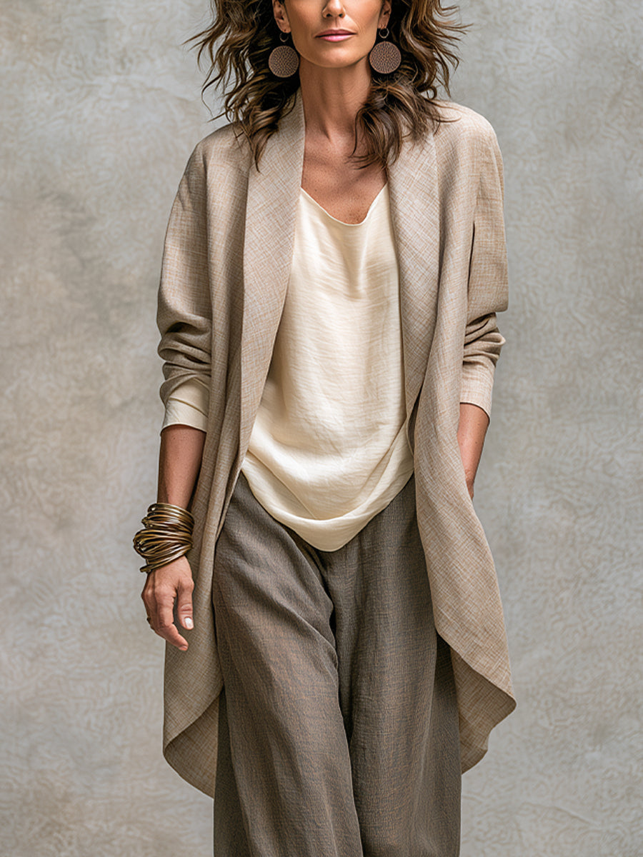 Selma linen three-piece set, close-up of jacket, top, and trousers