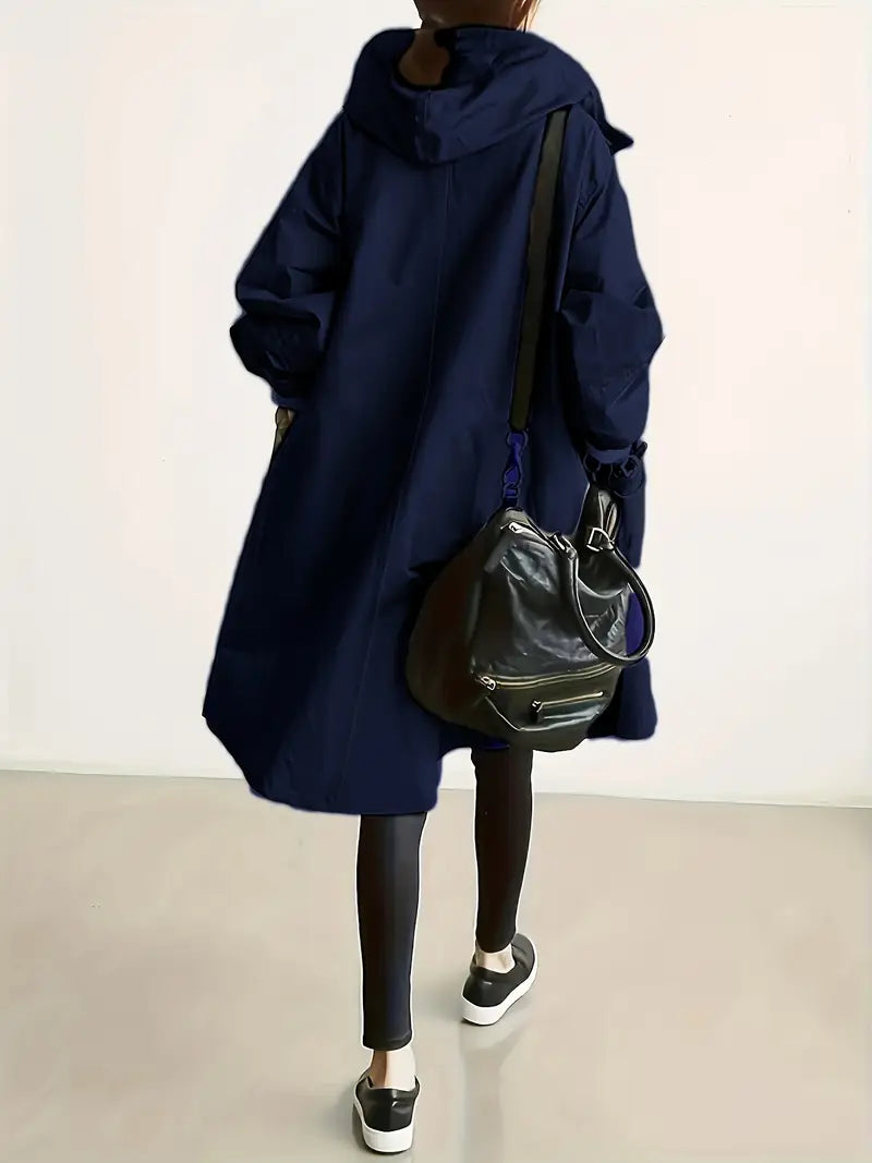 Edna oversized waterproof trenchcoat in navy blue, back view