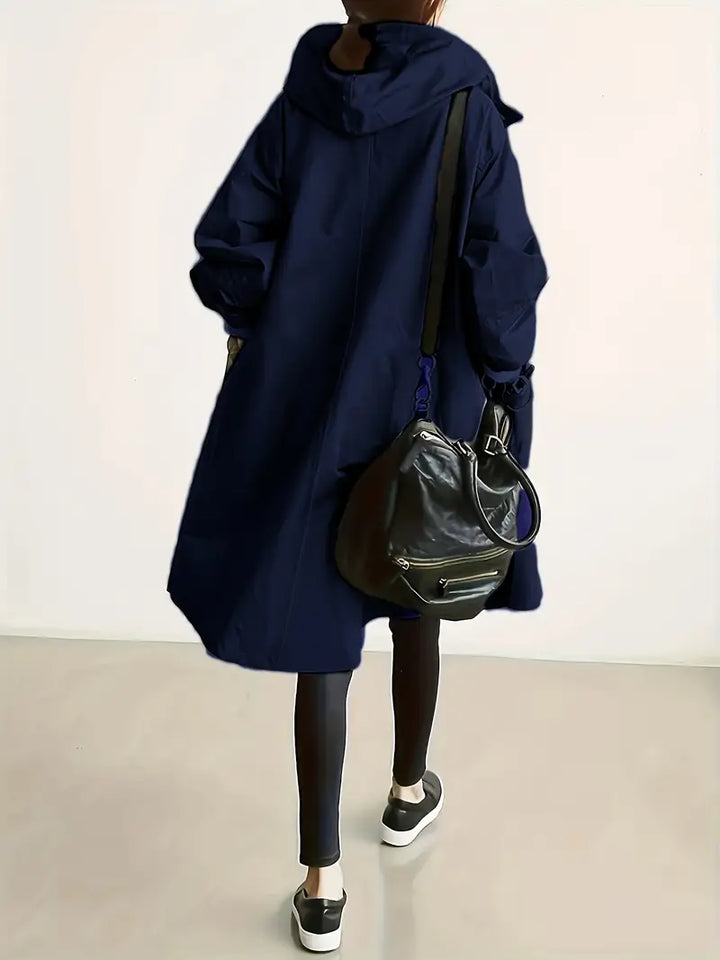 Edna oversized waterproof trenchcoat in navy blue, back view